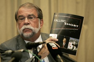 Bob Dietz, Asia coordinator for media watchdog, Committee to Protect Journalists (CPJ) holds up its just released report titled 'Falling Short' which says foreign and Chinese reporters continue to face intimidation just a year before the opening of the Beijing Olympic Games, despite China's pledges to the contrary, at a press conference in Beijing, 07 August 2007. 
