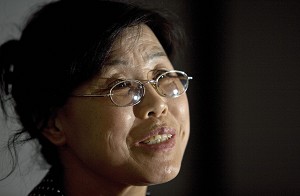 Gao Qinsheng, mother of Chinese journalist Shi Tao, talks with reporters 14 June 2007 in Washington, DC. Gao has called for US Internet giant Yahoo to be penalized for handing authorities the information that led to him being convicted of divulging state secrets after he posted a Chinese government order forbidding media organizations from marking the anniversary of the Tiananmen Square uprising on the Internet.