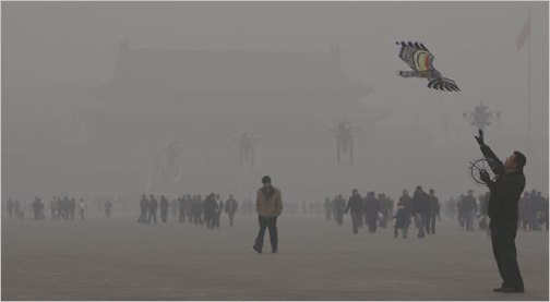 Beijing residents in Tiananmen Square, used to pea-soup smog, ignored a citywide stay-indoors warning on Thursday.
