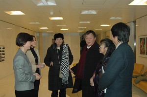 Mr. Wei and Miss Davies talking before the meeting
